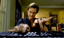 Jim Carrey Typing Furiously GIF meme template